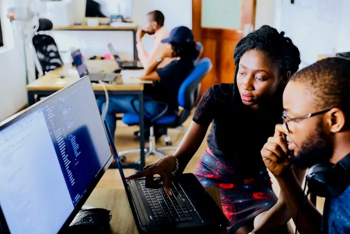Learners working on technical projects